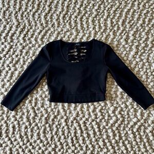 Black scoop neck, 3/4 sleeve top, knotted back. Fits small/medium.